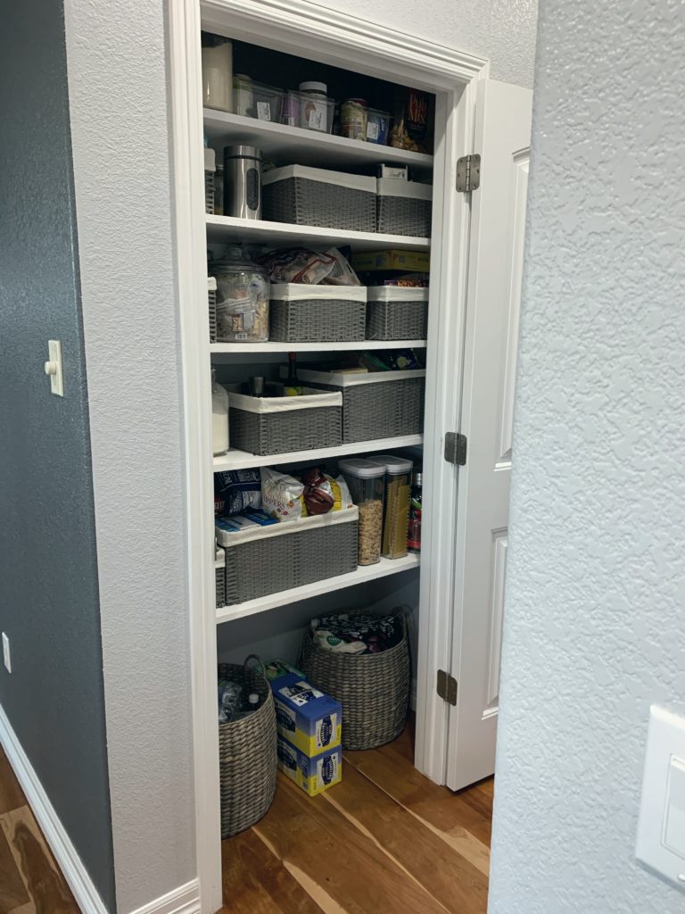 Finished pantry with wooden shelves